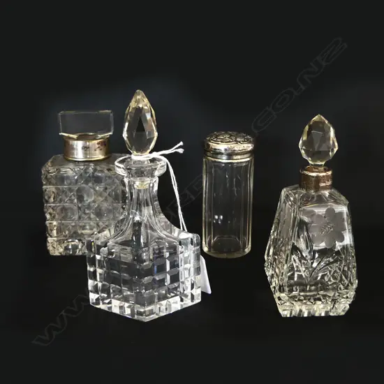4 CRYSTAL BOTTLES; 3 w. STG TRIM H.125mm 1 crystal top chipped to base