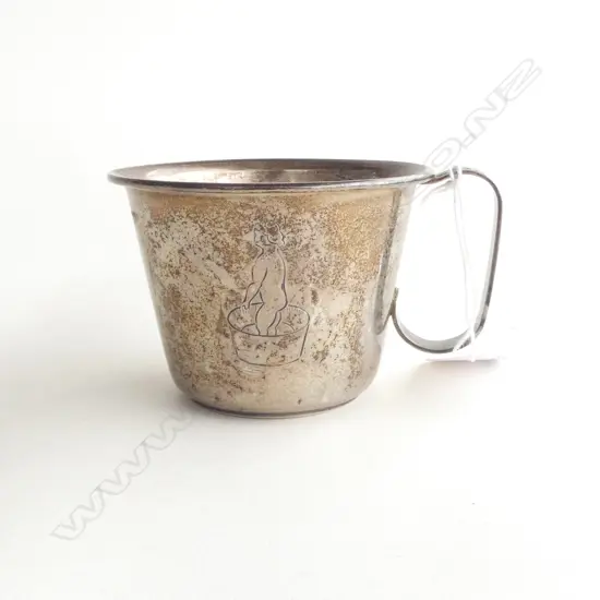 EUROPEAN SILVER CHRISTENING MUG engraved with child bathing. Stamped 830. 65gms