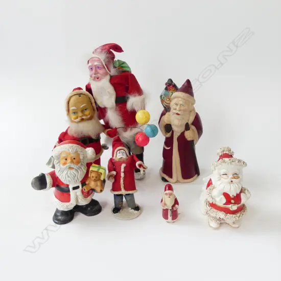 7 ASST. SANTAS INCL. SPARTAN H.190mm, WIND UP (WORKS)