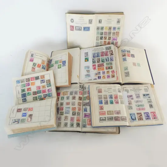7 VINTAGE STAMP ALBUMS