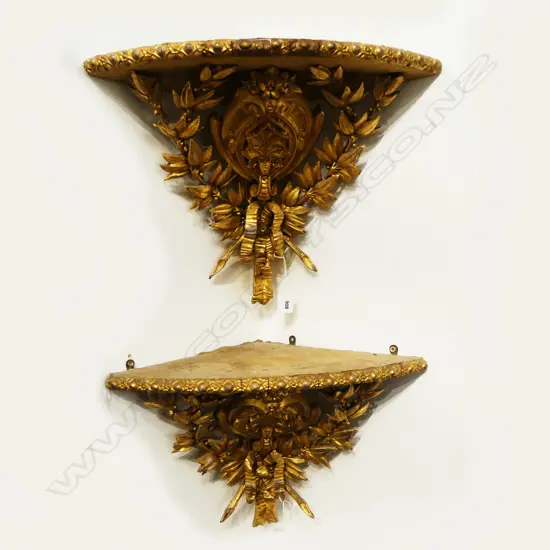 PR OLD LOUIS XV GILT WOOD & PLASTER SCONCES; Carved shield with laurel sprigs branching from ribbon bow, H.310mm, faults
