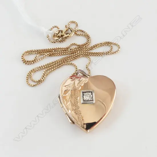 9ct GOLD .10 DIAMOND SET HEART LOCKET ON FINE CHAIN 6.54gms