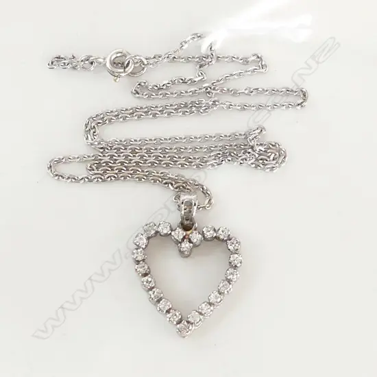 18ct DIAMOND SET HEART form PENDANT ON 18CT CHAIN 5.22gms. Ins. $3500