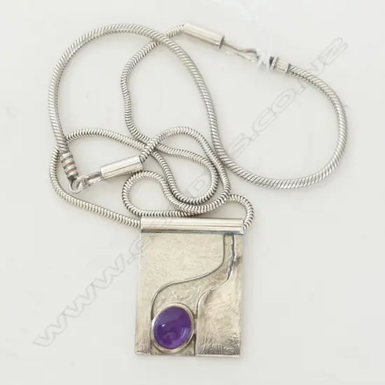 SILVER MODERNIST PENDANT w CABOCHON AMETHYST, by JENS HANSEN for exhibition at Watson's Jewellers ChCh. c.1980s.