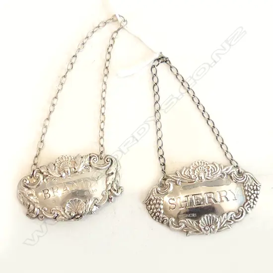 TWO STG SILVER DECANTER LABELS BRANDY & SHERRY LONDON & BIRMINGHAM HALLMARKS L.60MM