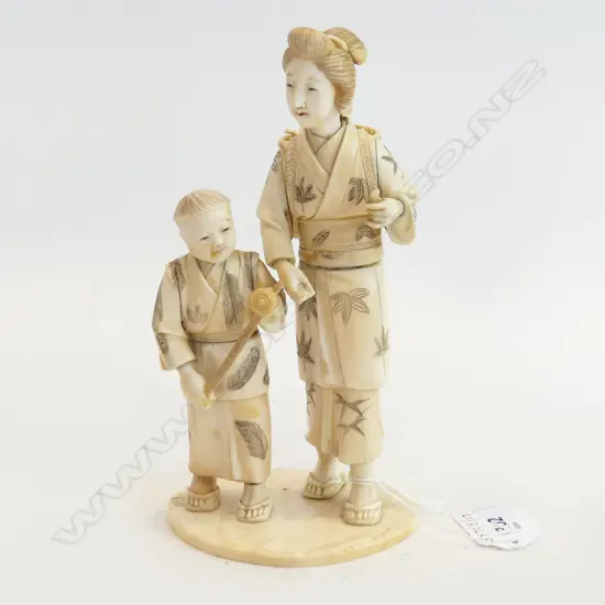 ANTIQUE IVORY SIGNED CARVING OF JAPANESE BOY AND LADY WITH FRUIT BASKET NB: SOME FAULTS H.18CM