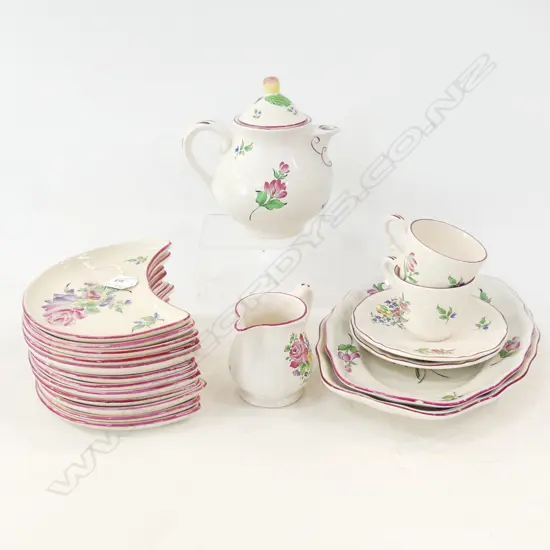 20PCS FRENCH 'LUNEVILLE' WARE, 12 CRESCENT SIDE PLATES, TEAPOT, MILK JUG, 2 CUPS & SAUCERS & 2 SERVING PLATES (damaged)