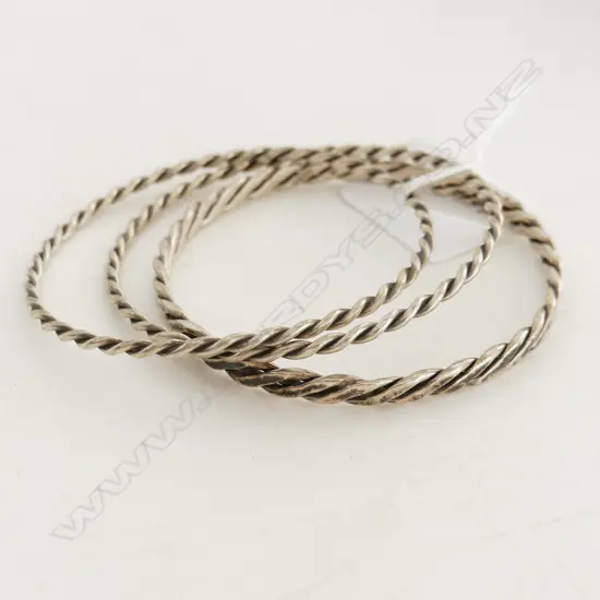 THREE 800 SILVER TWIST BANGLES