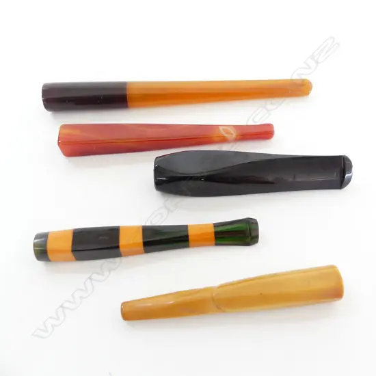 FIVE ART DECO BAKELITE CIGARETTE HOLDERS, L.80-140mm