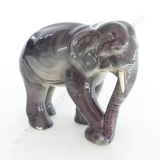 CROWN LYNN BLACK & PURPLE ELEPHANT FIGURE. H.165mm (sml chip to rear foot)