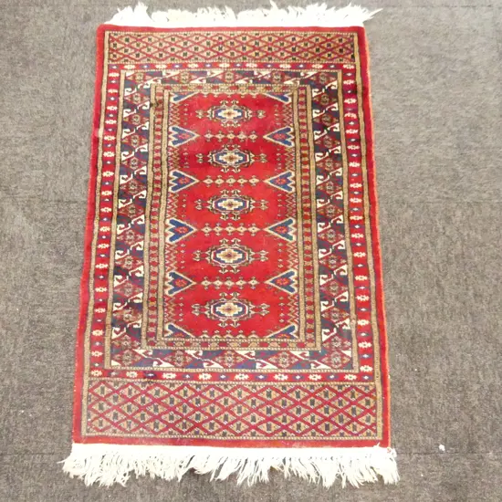 HAND KNOTTED WOOL PILE RUG 950x600mm