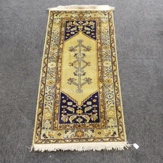 HAND KNOTTED WOOL PILE RUG 1300x660mm