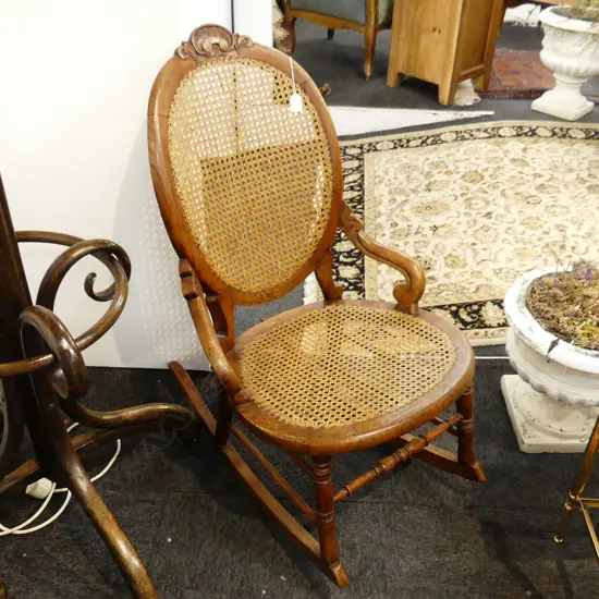 ANTIQUE WOODEN CANED ROCKER