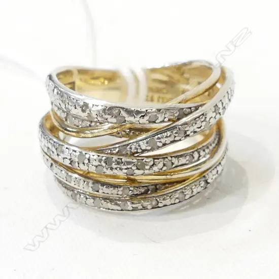 SILVER/GOLD PLATE CROSS OVER RING WITH DIA. CHIPS SIZE P 1/2 APPROX