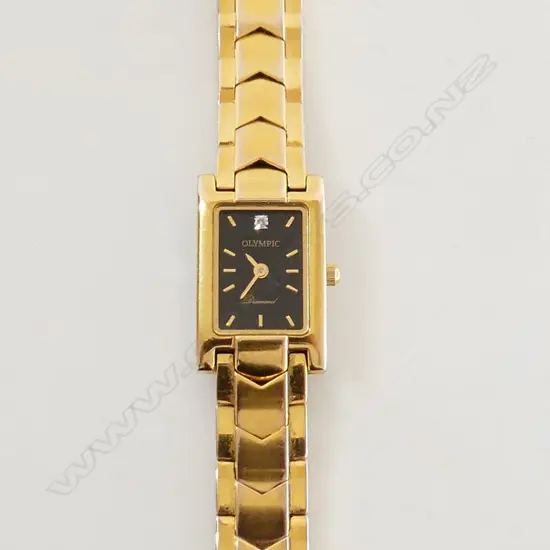 OLYMPIC 'DIAMOND' LADIES WRISTWATCH gold plate with diamond set to black dial