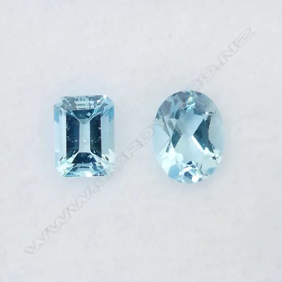 BLUE TOPAZ OVAL & OCT. CUT 2 = 4.13CT