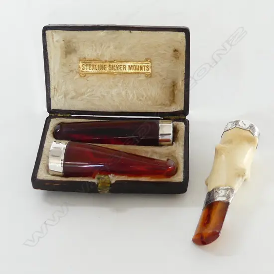 CASED SET CIGAR HOLDERS & ANOTHER