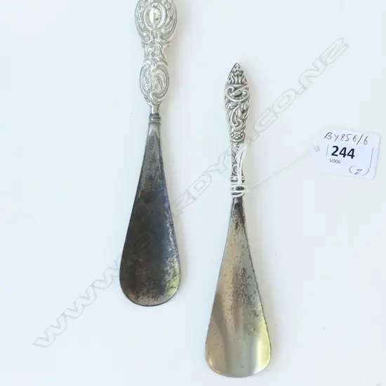 TWO STG SILVER HANDLED SHOE HORNS BIRMINGHAM 1903 & 1912 L.17CM