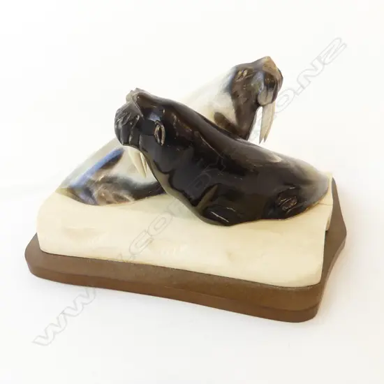CARVED BONE WALRUS AFLOAT ON AN ICEBERG W120MM