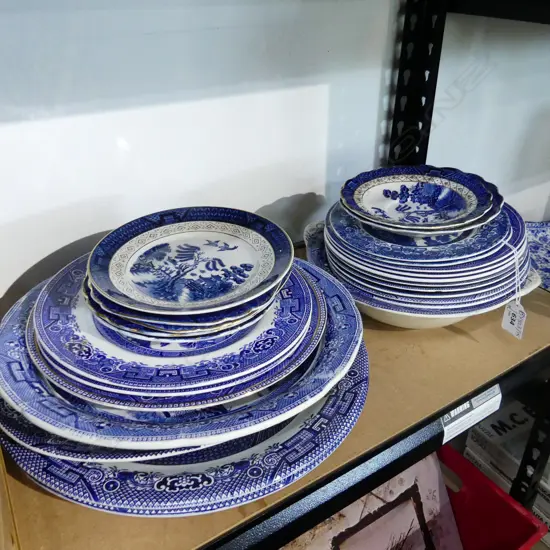 STACK OF ASST. B/W WILLOW PLATES 