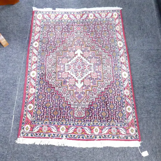 HAND KNOTTED WOOL PILE RUG 1000x720mm