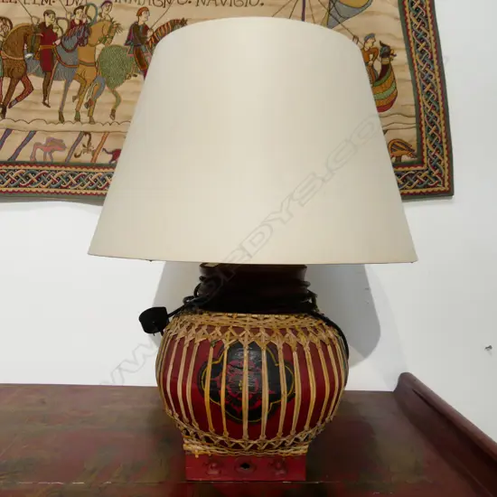 ASIAN RED PATINATED CANE COVERED TABLE LAMP. D.300 H.700mm