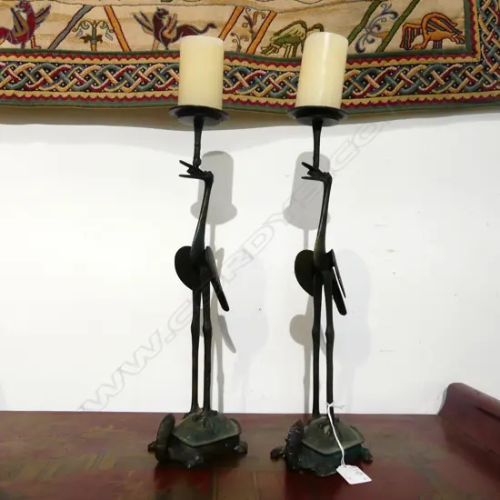 PAIR IRON CANDLESTICKS AS CRANES. H.375mm