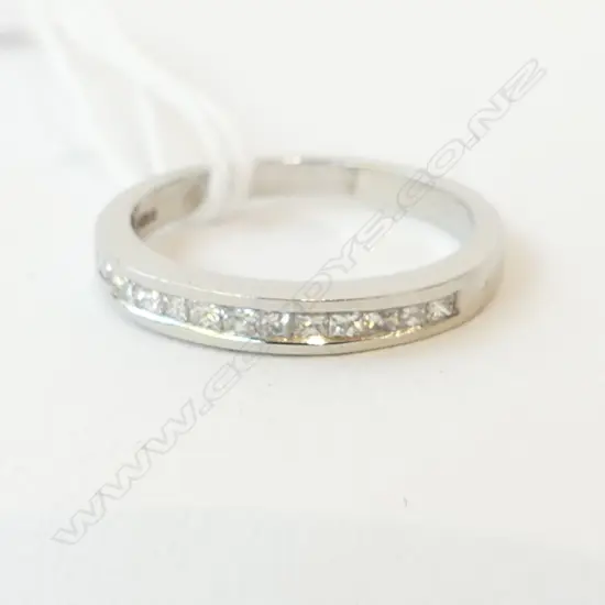 PLATINUM PRINCES CUT DIAMOND SET ETERNITY RING, 3.7gm diamond 0.5ct, size L