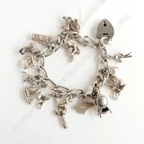 SILVER CHARM BRACELET 14 CHARMS 40gms