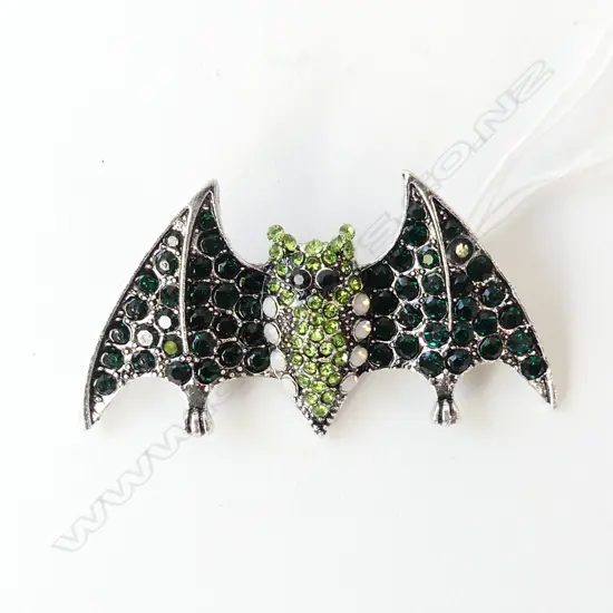 DRAMATIC 'BAT' BROOCH, GREEN & BLACK DIAMANTE