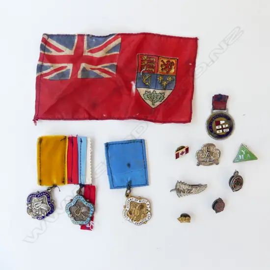 TRAY OF OLD ENAMEL BADGES & FLAG – NZS RANGITOTO, LONDON ACADEMY OF MUSIC, GIRL GUIDES, YHA, CANADA ETC