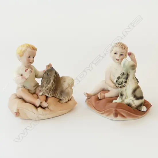 PAIR OF HAND PAINTED PILLOW BABIES PLAYING WITH DOGS L.10CM 