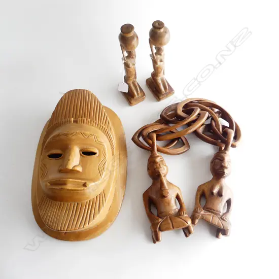 FIVE LIGHT COLORED CARVED AFRICAN ITEMS A MASK L.320mm TWO FIGURES WITH INTERLOCKING WOODEN RINGS & TWO SMALL FIGURES .