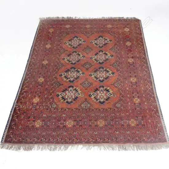 PERSIAN HANDKNOTTED WOOL FLOOR RUG. OVERALL TERRACOTTA TONE WITH EIGHT CENTRAL MEDALLIONS. 2000 x1580mm