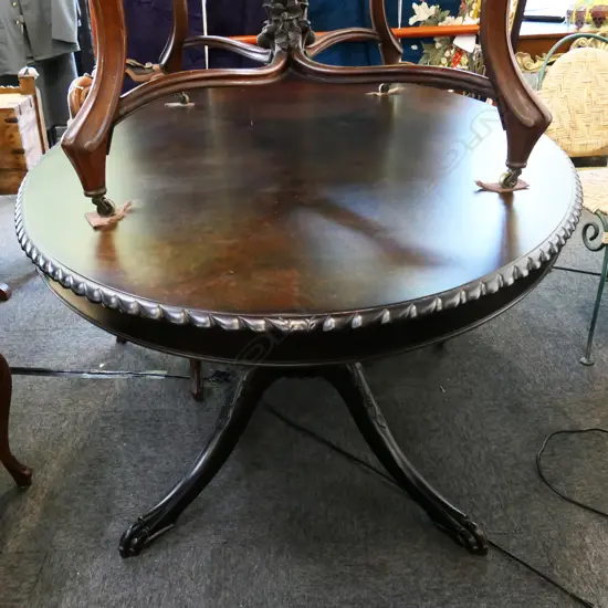 MAHOGANY PEDESTAL CARVED DINING TABLE