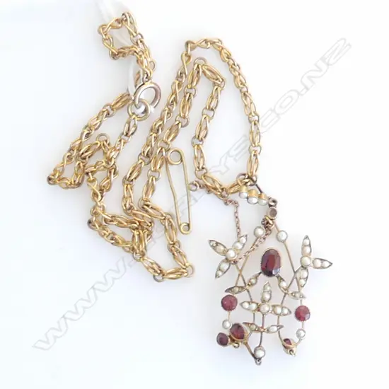 EDWARDIAN 9CT GOLD GARNET & SEED PEARL PENDANT on  9CT GOLD CHAIN TOTAL WEIGHT 11.4gm