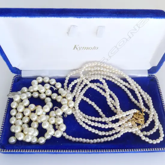 2 STRANDS OF PEARLS 1 requiring restringing costume?