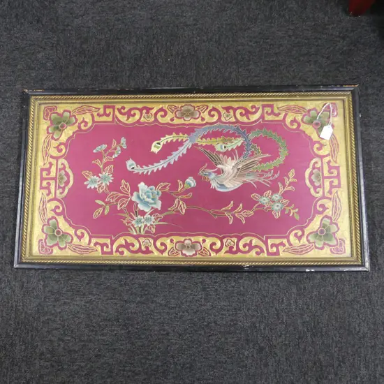 CHINESE FINE SILK EMBROIDERED FRAMED PICTURE PHOENIX & FLORALS in scrolling border. On red ground 465 x 870mm