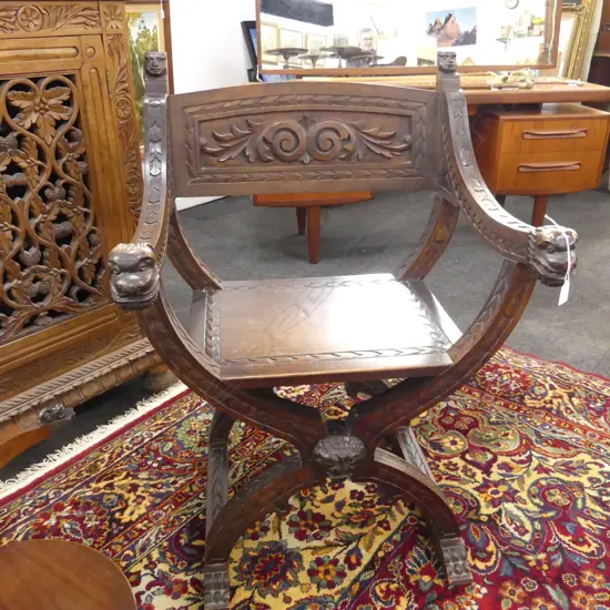 CARVED WOODEN X CHAIR