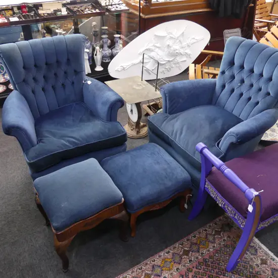 PAIR OF BLUE BUTTON BACKED ARMCHAIRS EACH WITH STOOL