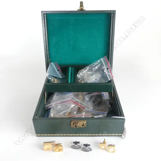 GREEN LEATHER JEWEL BOX WITH 17 PAIRS RETRO CUFFLINKS. The gold tooled box 215 x 195mm