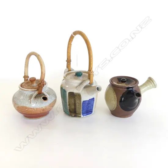 3 VINTAGE NZ STUDIO POTTERY TEAPOTS, 2 w CANE HANDLES & POTTERS MARKS & 1 OTHER