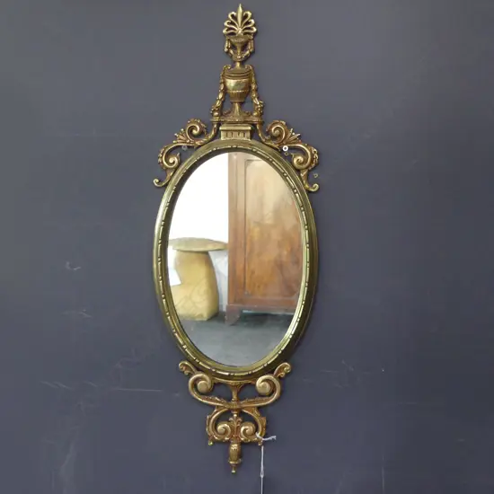 BRASS FRAMED OVAL MIRROR