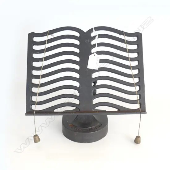 OLD CAST IRON BOOKREST