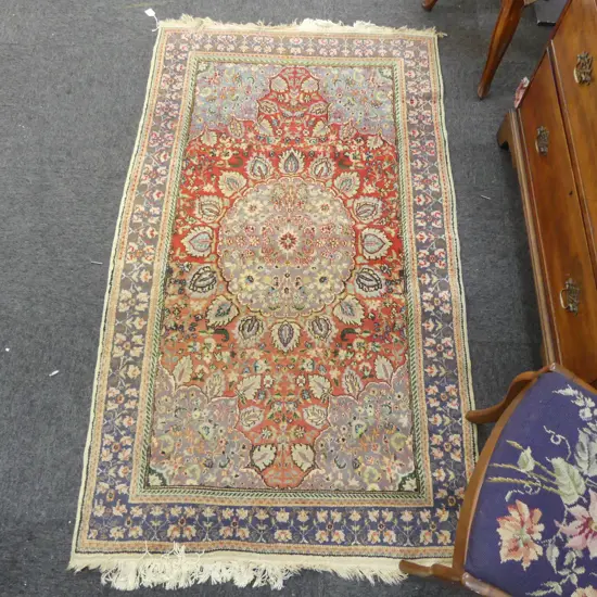 HAND KNOTTED WOOL PILE RUG