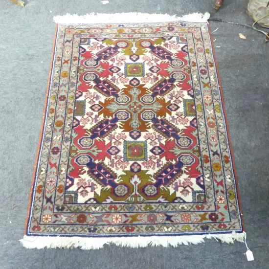 HAND KNOTTED WOOL PILE RUG