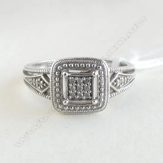STG SILVER AND DIAMOND RING SIZE P