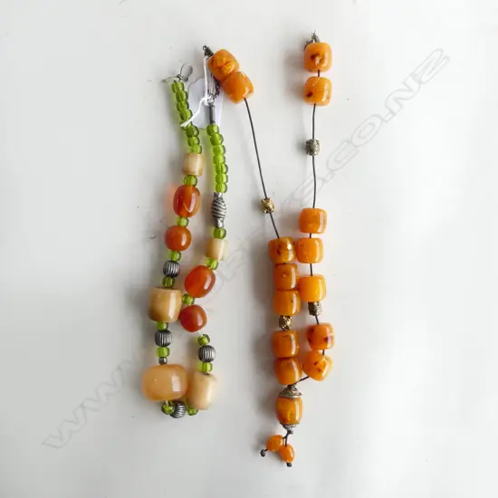2 AMBER STYLE NECKLACES L.520mm