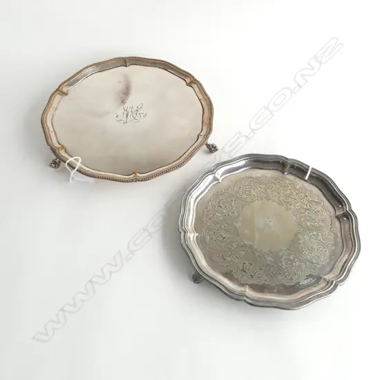 c.1900 SILVER PLATE SALVER scroll engraved. Crested raised hand holding a cross. Dia.255mm