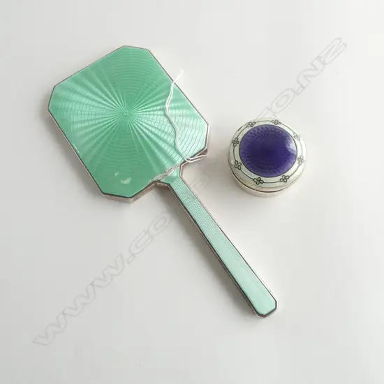 2 SILVER & GUILLOCHE ENAMEL VANITY ITEMS: green hand mirror London 1940 + purple box Birm.1910. Both with slight faults